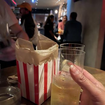 Double Chicken Please - Lemongrass Shochu with green tea and popcorn chicken. - Cocktail Bars Near Me - New York, New York
