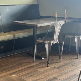 The location is disgusting. Behind the counter is filthy, all the tables are filthy. Every table looked like this or worse. The location is disgusting. Behind the counter is filthy, all the tables are filthy. Every table looked like this or worse.