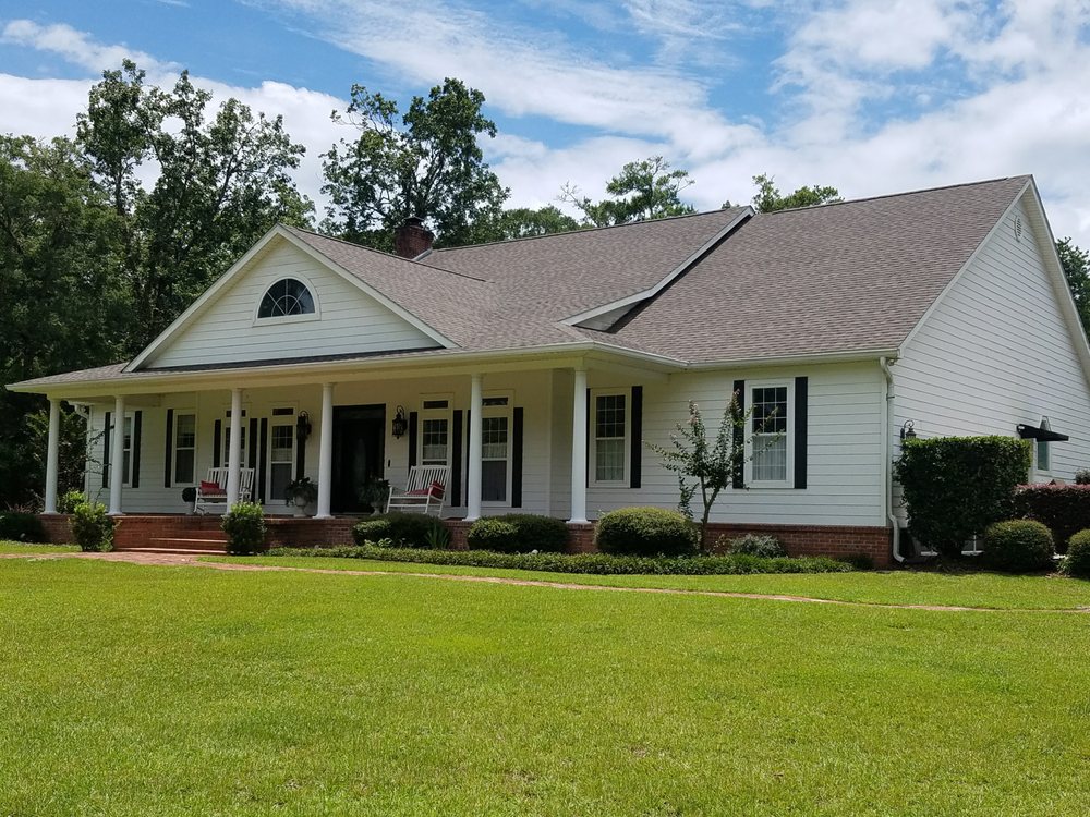 Slide of Logan Roofing