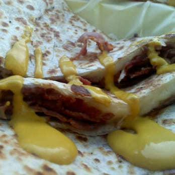 Eat 'Em Up Truck - Pastrami Quesadilla (close up) - Street Vendors Near Me Eat 'Em Up Truck - Pastrami Quesadilla (close up) - Street Vendors Near Me