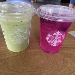 Left: Iced Matcha Green Tea Latte with oatmilk Right: Dragon Drink Left: Iced Matcha Green Tea Latte with oatmilk Right: Dragon Drink