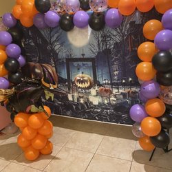 Bust Out Balloons - Spooky Halloween background and witch