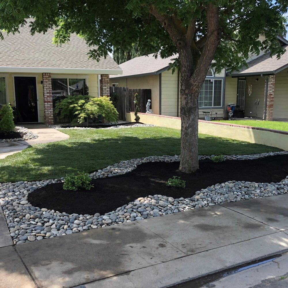 Israel's Gardening - Finished Product after they rolled o0ut new sod. - Landscaping Near Me