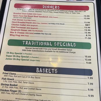 Midway Oh-Boy Restaurant - Menu - The menu displays dinner choices, traditional specials, and basket options, including prices and descriptions, at a restaurant. It features items like breaded veal cutlet, fish dinner, and chicken finger. - American Near Me - Elyria, Ohio