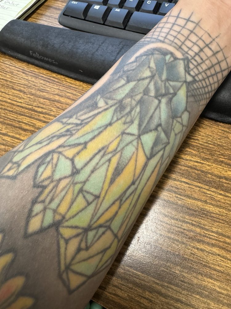 Main Street Electric Tattoo Company Logo