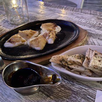 Poseidon - Lava cheese saganaki - Greek Near Me - Miami Beach, Florida Poseidon - Lava cheese saganaki - Greek Near Me - Miami Beach, Florida