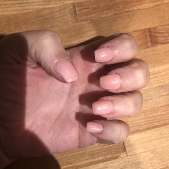 Hollywood Nails - See how middle finger is shaped incorrectly.  See thumb nail looks funky. - Nail Salons Near Me - Denver, Colorado