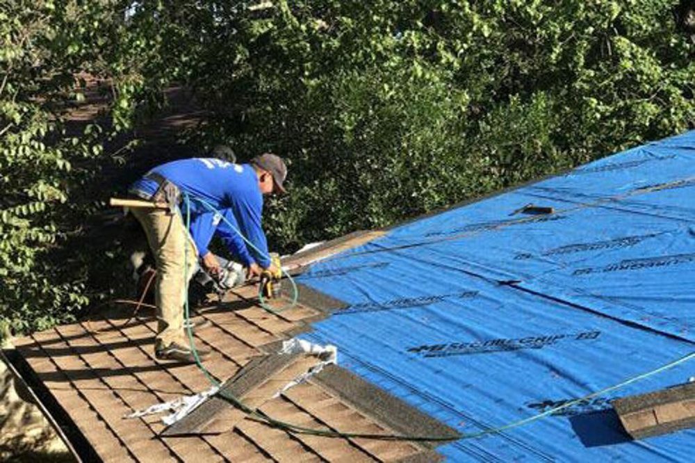 Slide of Heartland Roofing & Construction