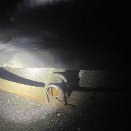Picture sent out around 2 AM to dispatch at Murphy's towing  my axle was broken