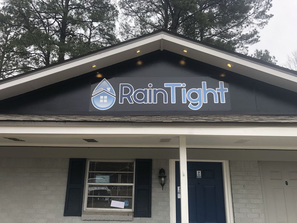 Slide of Rain Tight Roofing