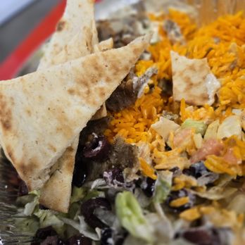 The Halal Guys - Combo platter (Sorry I couldn't wait. I started eating before taking the photo. ) - Middle Eastern Near Me - Houston, Texas The Halal Guys - Combo platter (Sorry I couldn't wait. I started eating before taking the photo. ) - Middle Eastern Near Me - Houston, Texas