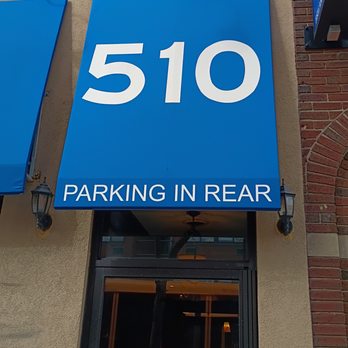 Mythos - The 'parking in rear' sign we both missed. - Greek Near Me - Buffalo, New York