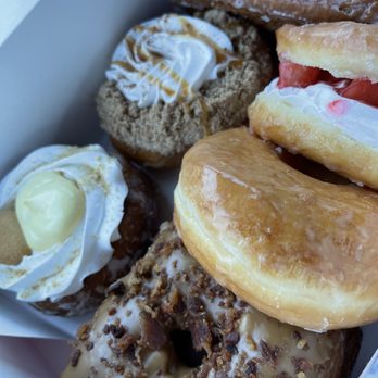 Pinkbox Doughnuts - BANANA PuddIN, SMASHIN APPLE, BUTTERMILK BAR, PORKY FACE DOuGHCRO®, OG, and SUp SHORTY - Donuts Near Me - Las Vegas, Nevada Pinkbox Doughnuts - BANANA PuddIN, SMASHIN APPLE, BUTTERMILK BAR, PORKY FACE DOuGHCRO®, OG, and SUp SHORTY - Donuts Near Me - Las Vegas, Nevada
