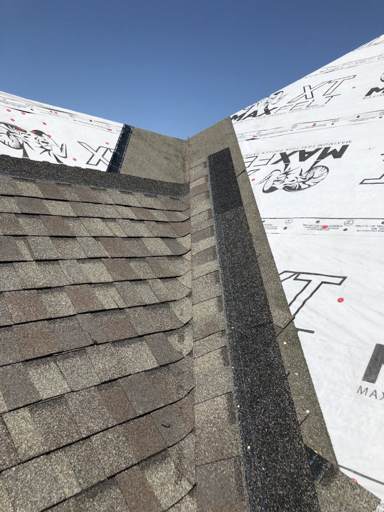 Slide of Erik's Roofing