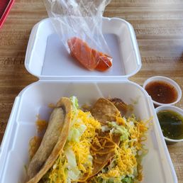 Chicken and beef tacos with carrots and salsa from the salsa bar!