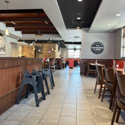Swiss Chalet Rotisserie & Grill - Enjoying the dark and AC after the beach.