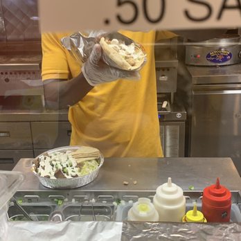 The Halal Guys - Gyro Platter and Chicken Sandwich (in the making) - Halal Near Me - Chicago, Illinois The Halal Guys - Gyro Platter and Chicken Sandwich (in the making) - Halal Near Me - Chicago, Illinois