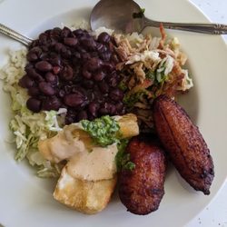 La Perla Del Sur - Lechon plate, yucas fritas, maduros