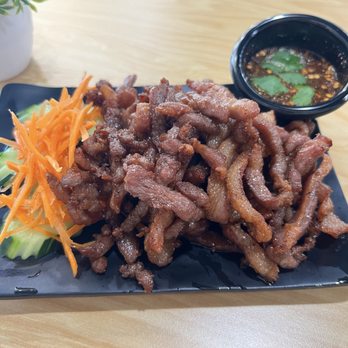 Thai Wok & Cafe - Pork jerky with tangy Jim jaew sauce - Thai Near Me - Fresno, California Thai Wok & Cafe - Pork jerky with tangy Jim jaew sauce - Thai Near Me - Fresno, California