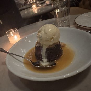 Buccan - Carrot cake, placed in a rum touffe glaze and vanilla ice cream scoop. - Seafood Near Me - Coral Gables, Florida Buccan - Carrot cake, placed in a rum touffe glaze and vanilla ice cream scoop. - Seafood Near Me - Coral Gables, Florida