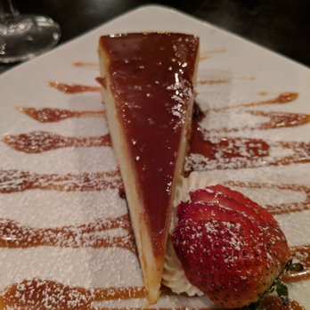 Contigo Latin Kitchen - Contigo's flan is one of the best desserts in Tucson. - Spanish Near Me - Tucson, Arizona