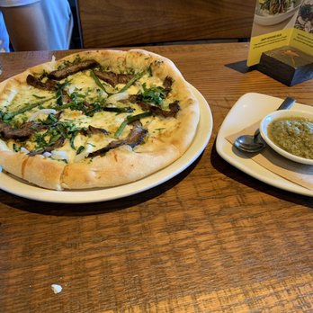 California Pizza Kitchen - Carne asada pizza is incredible. The salsa verde is a perfect accompaniment. - Pizza Near Me - Ann Arbor, Michigan California Pizza Kitchen - Carne asada pizza is incredible. The salsa verde is a perfect accompaniment. - Pizza Near Me - Ann Arbor, Michigan