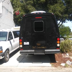 California Comfort Transportation - Rear storage in executive bus.
