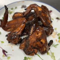 Chicken Wings. Available in Buffalo, Lemon Pepper, Garlic Parmesan, and Jerk.
