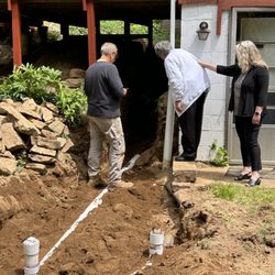 RPM Septic Systems - Mom looks at the trench
