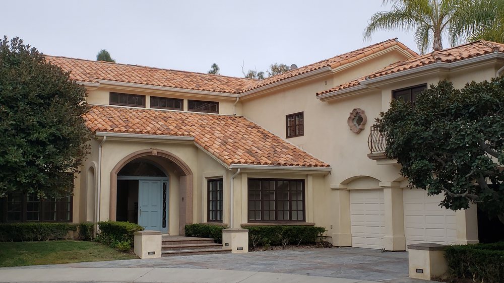 Slide of Rational Roofing Services