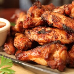 Garden Grille & Bar - Wings of the World - Chicken wings tossed and sauced. Choose Traditional Buffalo with Garden Ranch or Spicy Szechuan Orange. | 9