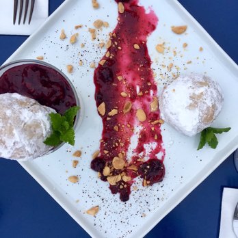 Baba On Central - Their version of panna cotta and almond cookies - Greek Near Me - St. Petersburg, Florida Baba On Central - Their version of panna cotta and almond cookies - Greek Near Me - St. Petersburg, Florida