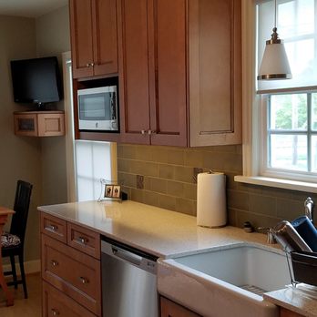 Delta Services Construction - a kitchen with a sink, stove, microwave, and dishwasher - General Contractors Near Me Delta Services Construction - a kitchen with a sink, stove, microwave, and dishwasher - General Contractors Near Me