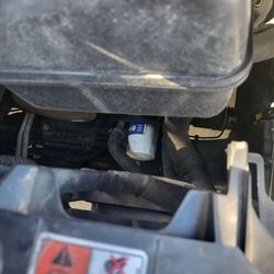 Conrad's Tire Express & Total Car Care - After oil change, with old filter still installed.