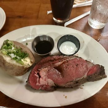 Black Angus Steakhouse - Prime Rib Entree with baked potato. - Steakhouses Near Me - San Jose, California Black Angus Steakhouse - Prime Rib Entree with baked potato. - Steakhouses Near Me - San Jose, California