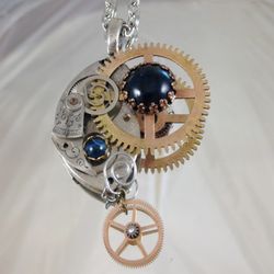 10PM Studio - This is the "barrel" of a pocketwatch and gear soldered on with drop gear and stones.