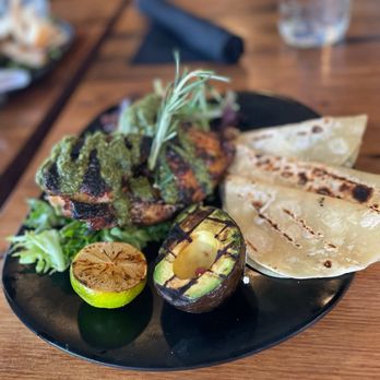 The Russell - Half chicken grilled with Chimichurri sauce, with grilled avocado, tortillas and lime - Salad Near Me - Kansas City, Missouri The Russell - Half chicken grilled with Chimichurri sauce, with grilled avocado, tortillas and lime - Salad Near Me - Kansas City, Missouri