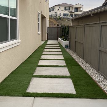 Exotic tiki - Side of home with planters - Patio Coverings Near Me