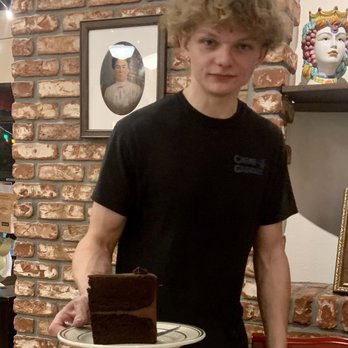 Mandola's Italian Kitchen - Massive piece of decadent dark chocolate cake. - Italian Near Me - Riverview, Florida Mandola's Italian Kitchen - Massive piece of decadent dark chocolate cake. - Italian Near Me - Riverview, Florida