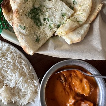 Kamana Kitchen - TOP: Cheese Naan,
BOTTOM: Chicken Tikka Masala - Indian Near Me - Hilo, Hawaii Kamana Kitchen - TOP: Cheese Naan,
BOTTOM: Chicken Tikka Masala - Indian Near Me - Hilo, Hawaii