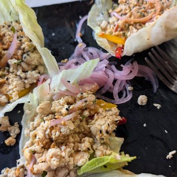 Black Walnut Café - Chicken lettuce wraps. A couple bites missing. Yum. - New American Near Me - Houston, Texas