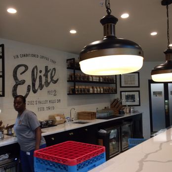 Magnolia Table - Elite sign behind bar - Breakfast & Brunch Near Me - Waco, Texas