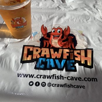 Crawfish Cave - Sapporro beer and bibs - Cajun/Creole Near Me - Fullerton, California