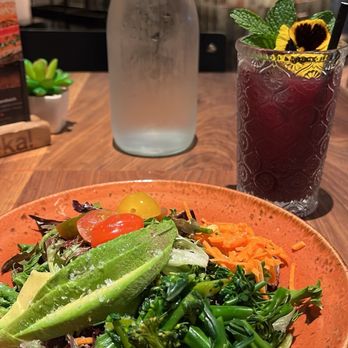 Eureka! - Lunch Special: Eureka Salad and Lavender Iced Tea. Not shown is Fresno Fig Burger on arugula with Truffle Cheese Fries. - American Near Me - Clovis, California