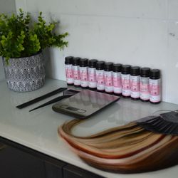 Arlow Salon - Our color bar is stocked with Redken + L'Oréal professional color and Bellami extensions