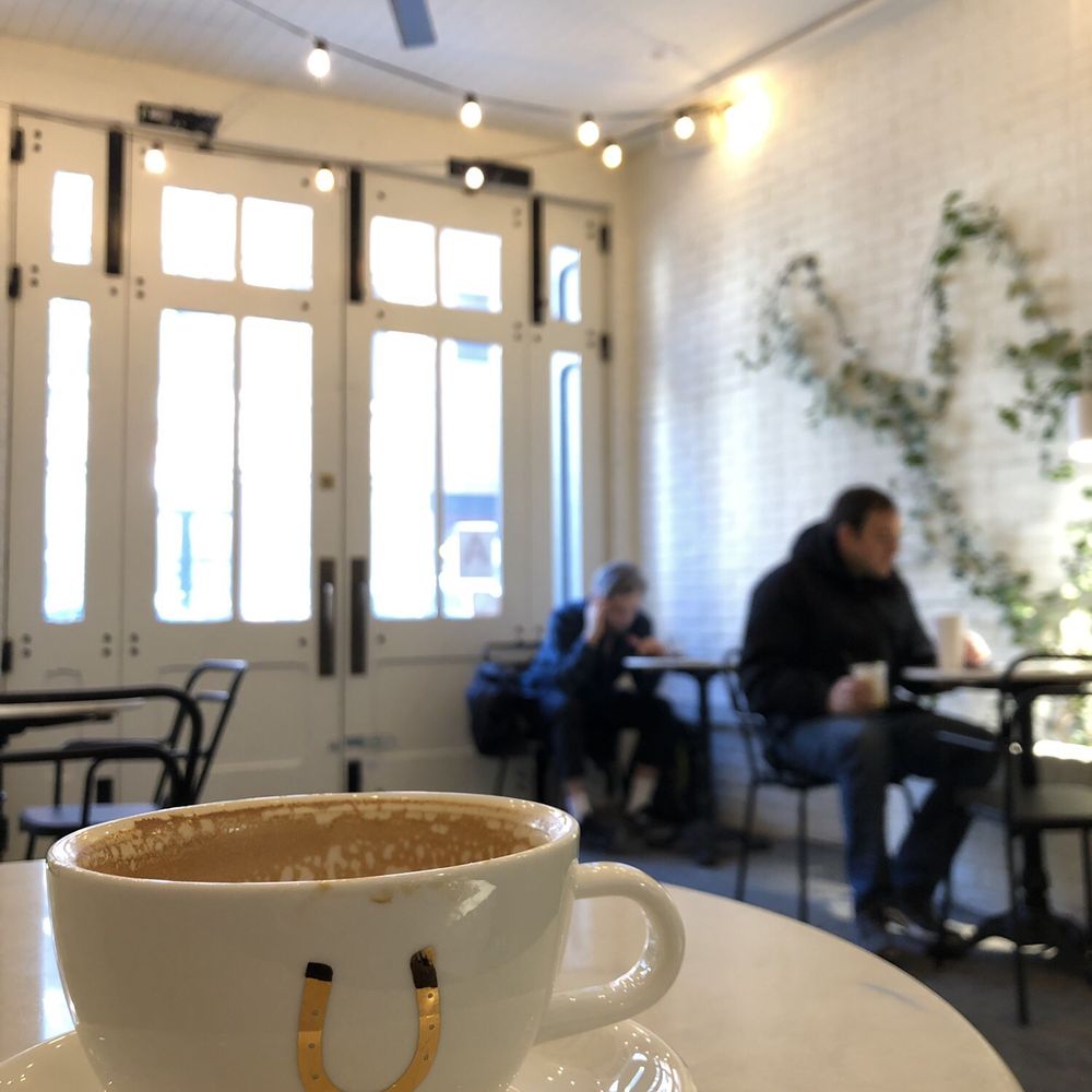 Stumptown Coffee Roasters - Latte in the foyer/chill seating area. - Coffee & Tea Near Me - Brooklyn, New York