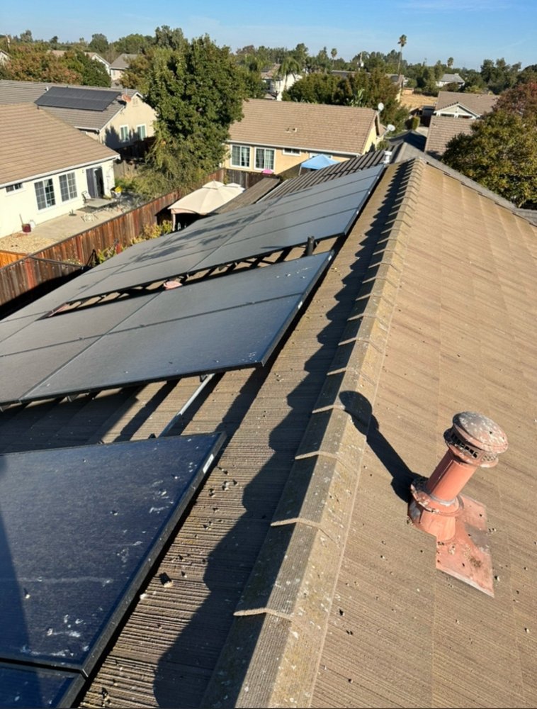 Slide of Top Elevation Roof Cleaning And Repair