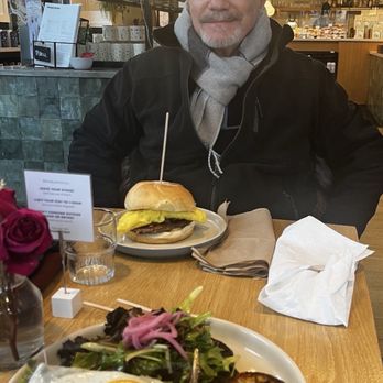Snake River Roasting Company - Hot chocolate, Breakfast Sandwich with bison sausage patty and scrambled egg, along with Avocado Toast and egg. Oh so delicious. - Coffee Roasteries Near Me - Jackson, Wyoming
