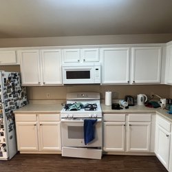 AG Custom Painting - Brown cabinets to pure white cabinet painted