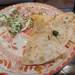 Veggie Quesadilla that was half eaten when I took the photo. Veggie Quesadilla that was half eaten when I took the photo.